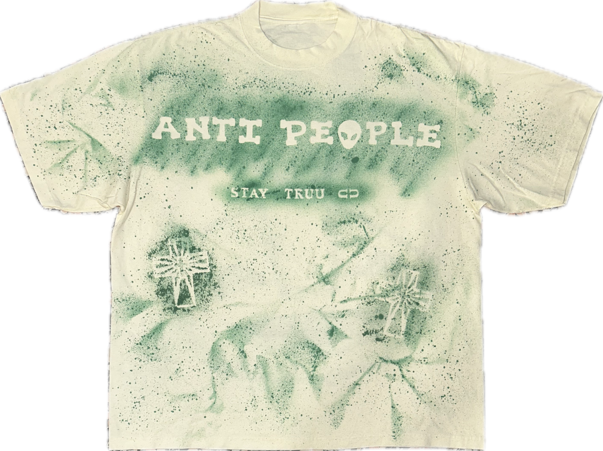The Green Guy heavyweight tee showing the original painted character design